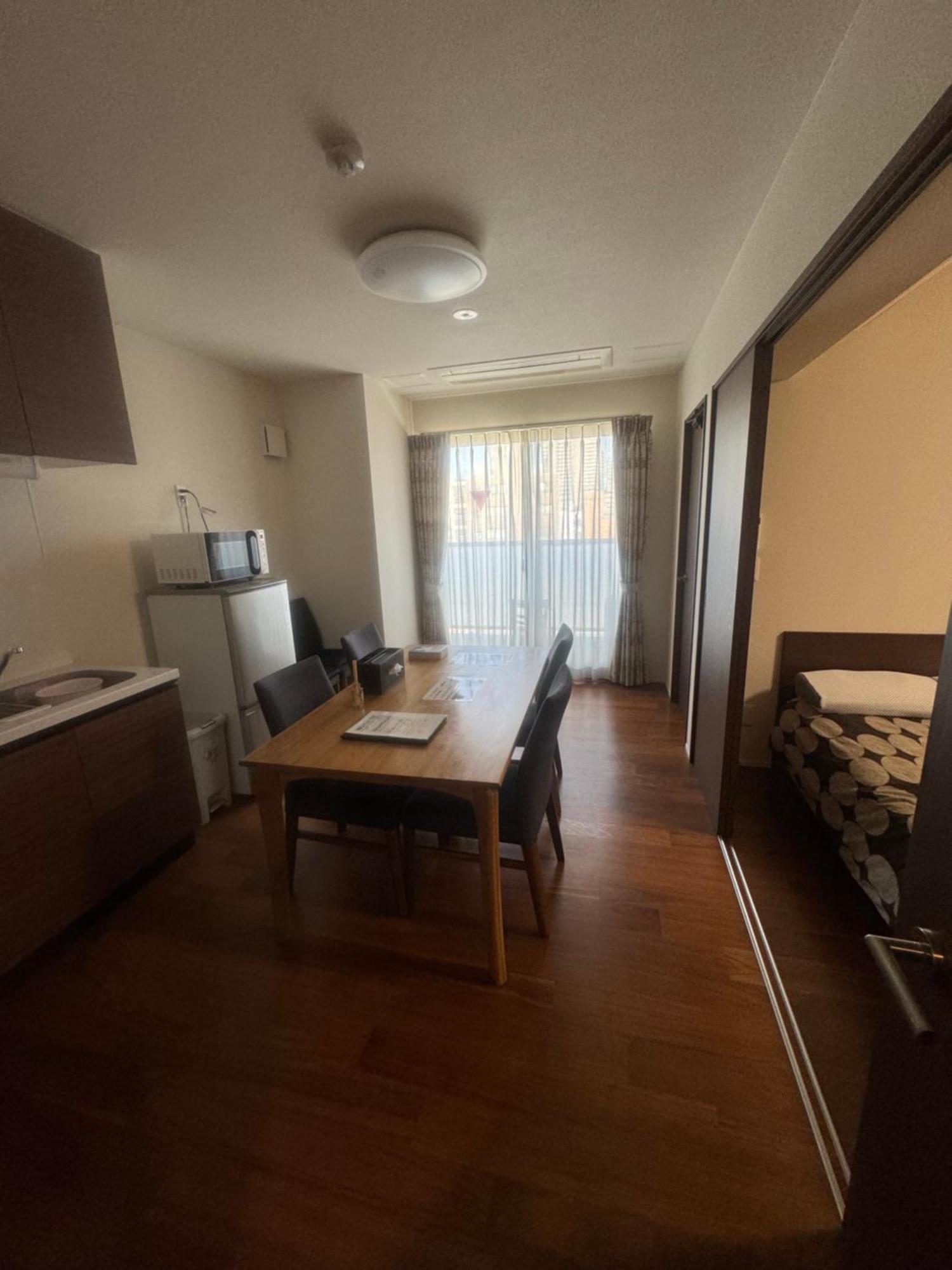 Residence Saku Ōsaka Extérieur photo