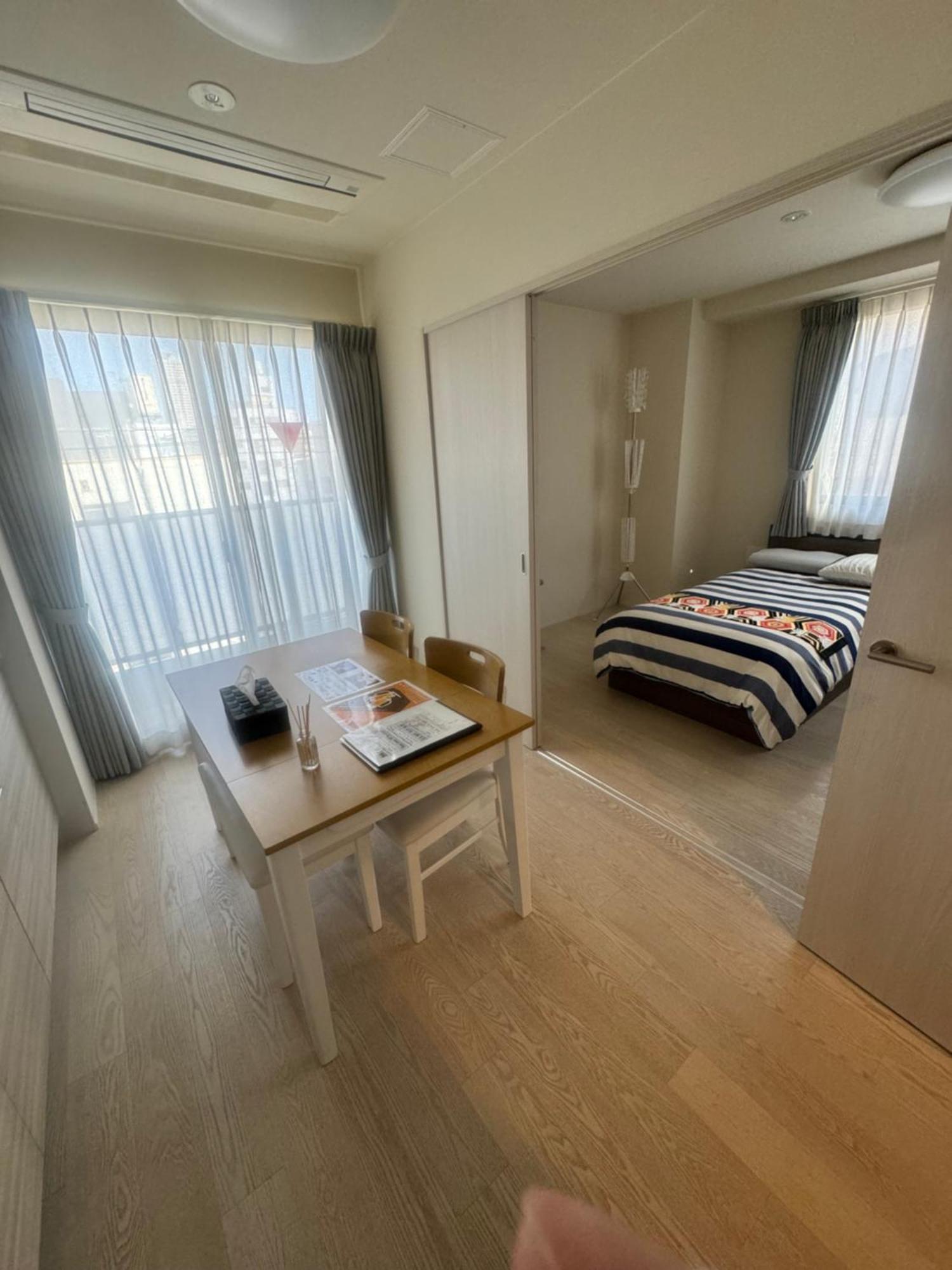 Residence Saku Ōsaka Extérieur photo