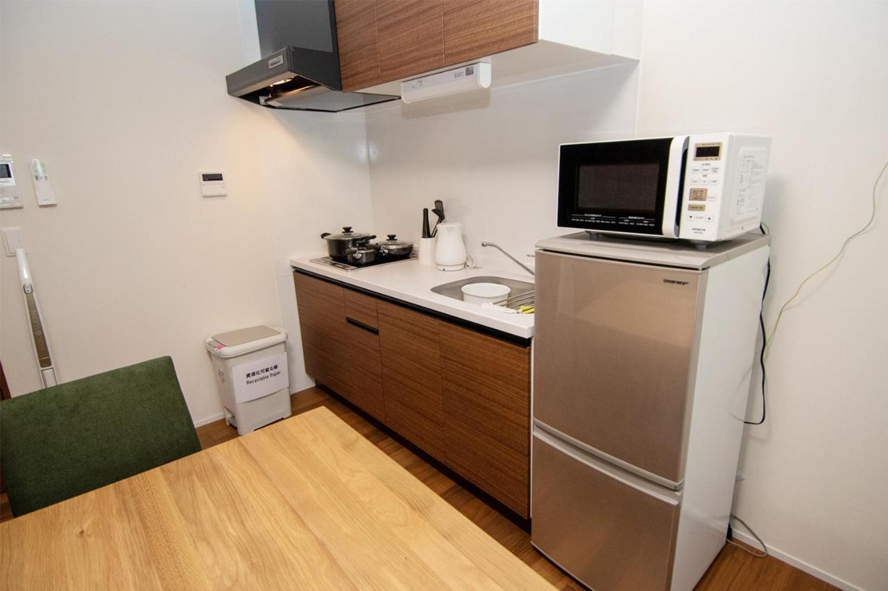 Residence Saku Ōsaka Extérieur photo